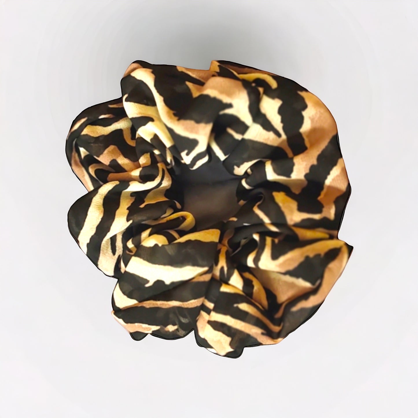 "Safari Chic Animal Print Scrunchie: Wild Style for Your Hair"